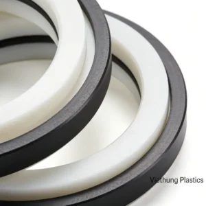 Close-up of wear-resistant sealing components made of PEEK and PTFE from Viethung Plastics.