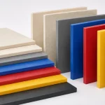 Custom extruded natural and colored ABS plastic sheet showcasing precision surface texturing and color matching.