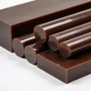 Tấm và cây nhựa POM-H + PTFE màu nâu sẫm dùng trong gia công cơ khí chính xác