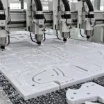 Máy cắt router CNC tự động xếp phôi nesting tối ưu phế liệu tấm nhựa kỹ thuật tại xưởng gia công Việt Hưng Plastics.